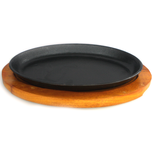 Cast iron oval sach dish with wooden base, 26cm